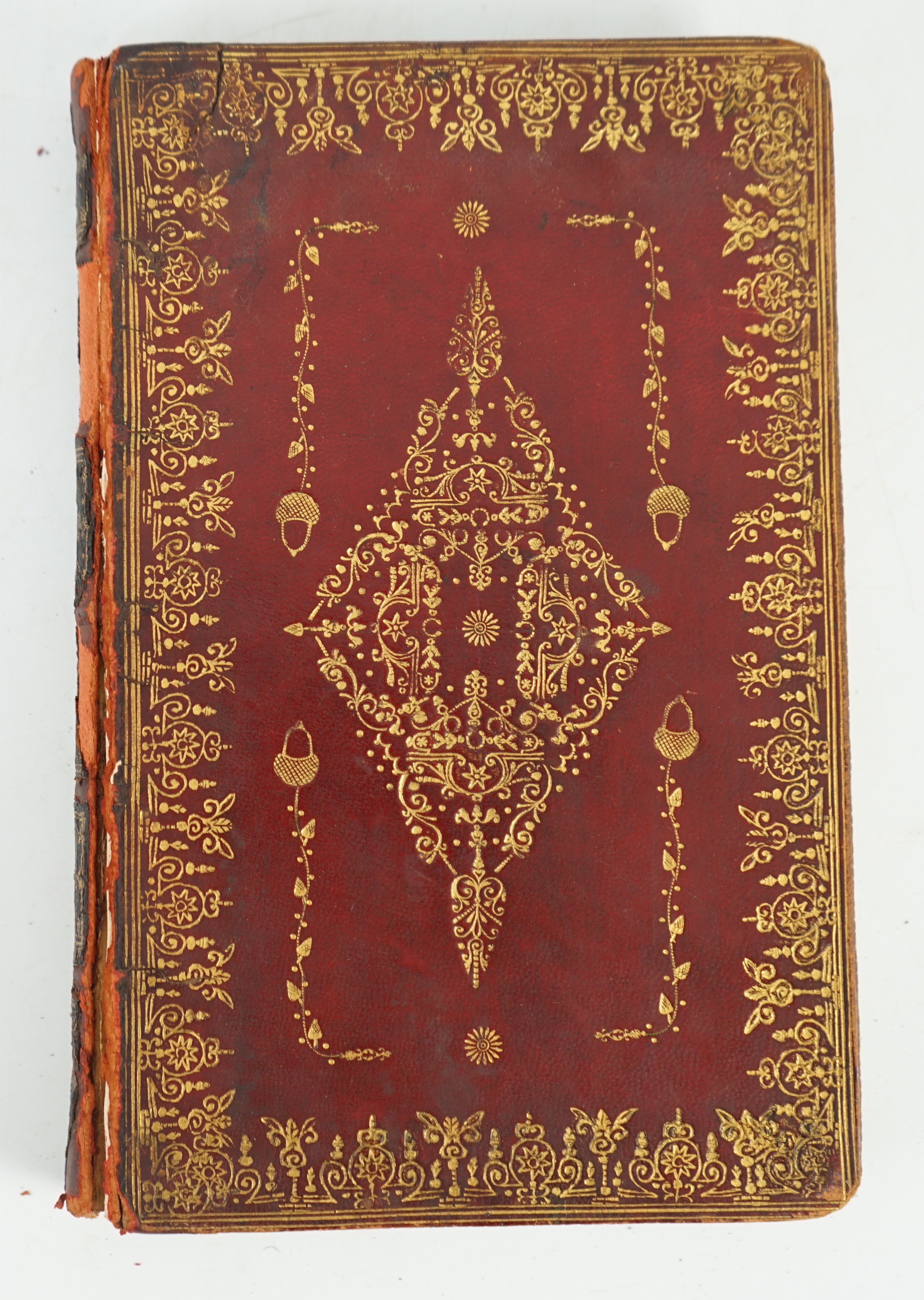 Book of Common Prayer and Administration of the Sacraments - Experimental edition, 8vo, red morocco, panel gilt embossed with lozenge devices and acorns, engraved title, portraits, volvelle to title verso, and vignette p